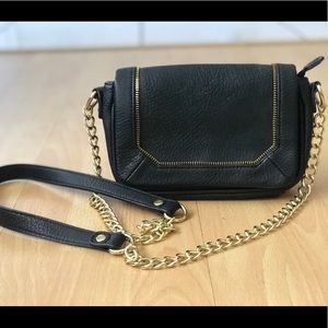 Black and gold cross body bag
